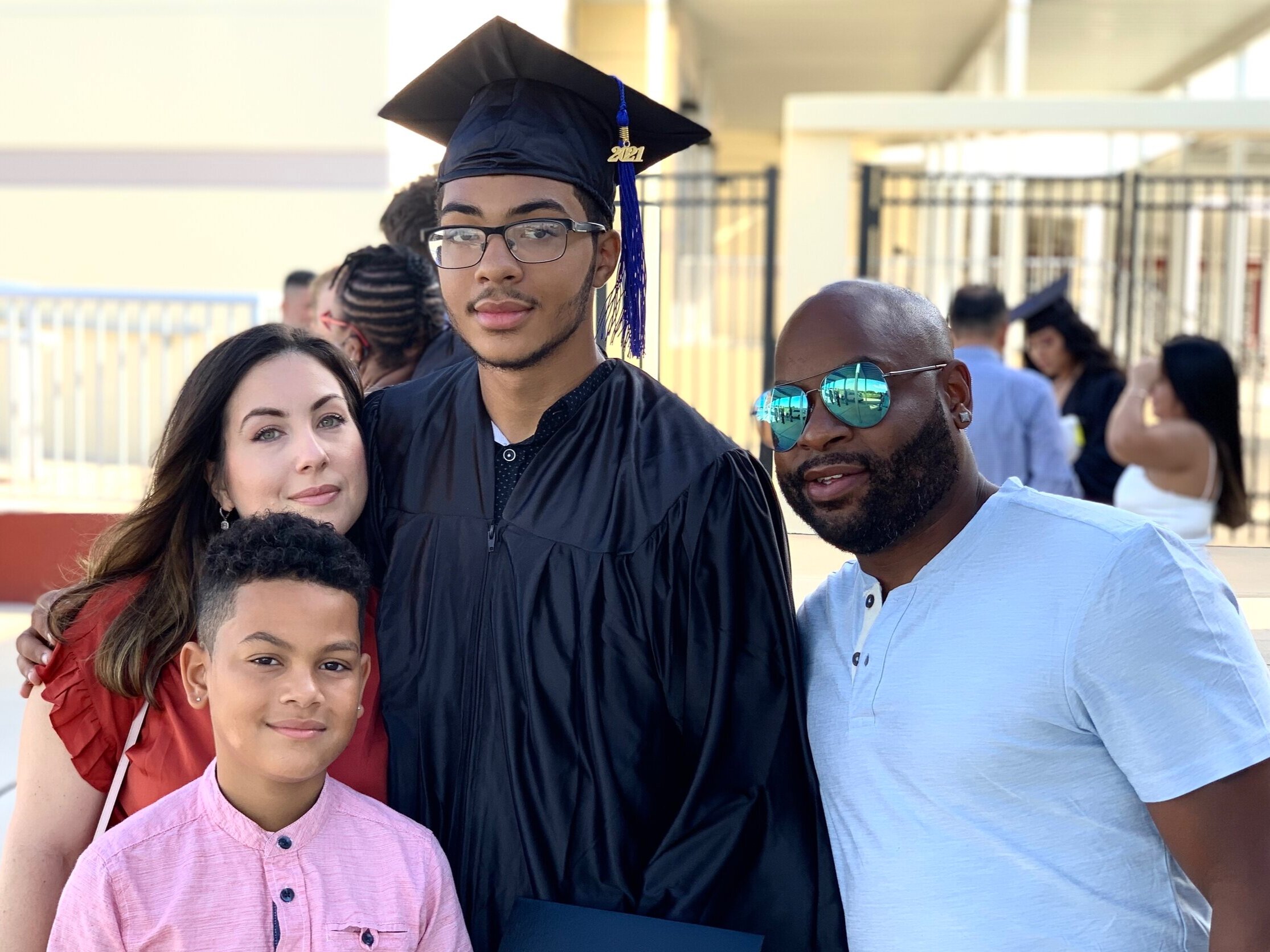 St. Lucie Acceleration Academies graduate Juvan Lester smiles with family