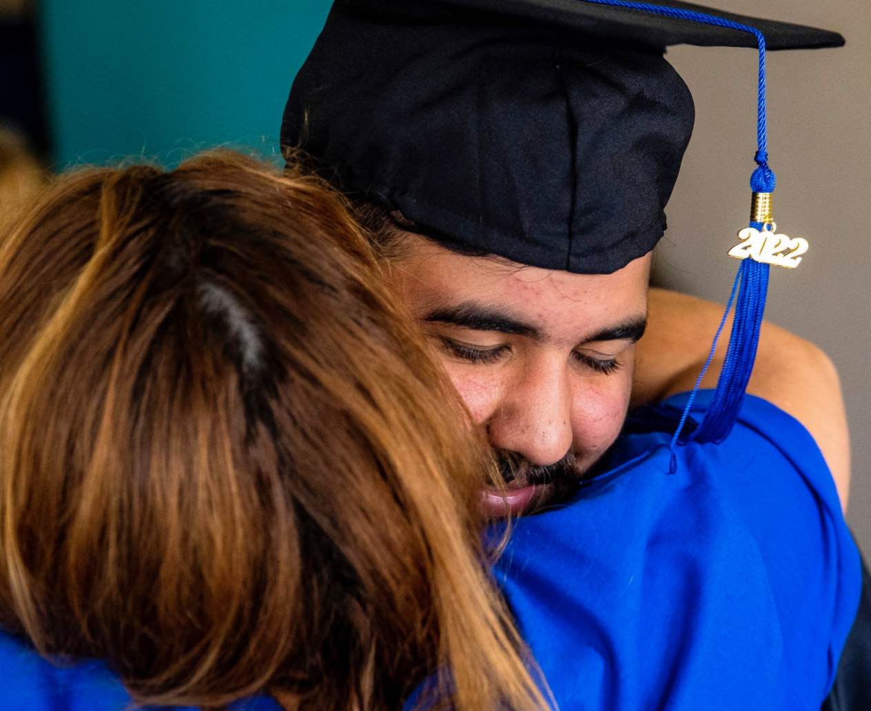 Acceleration Academy graduate hugging mom