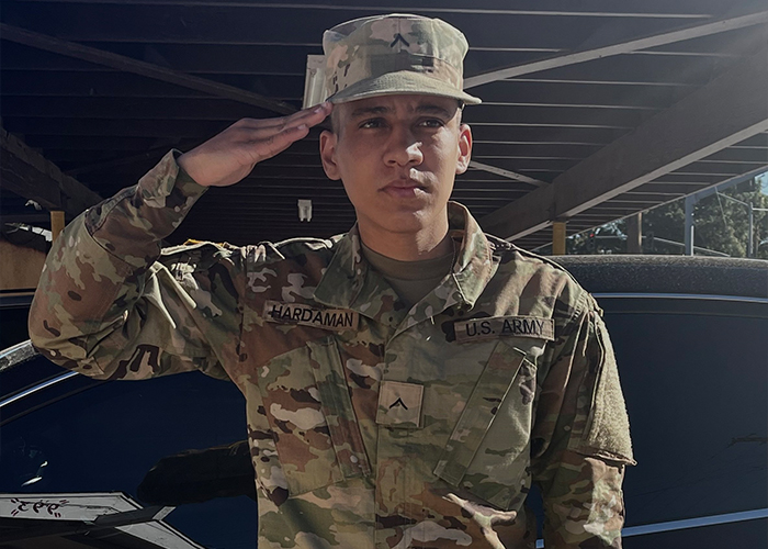 Elijah Hardaman saluting in uniform